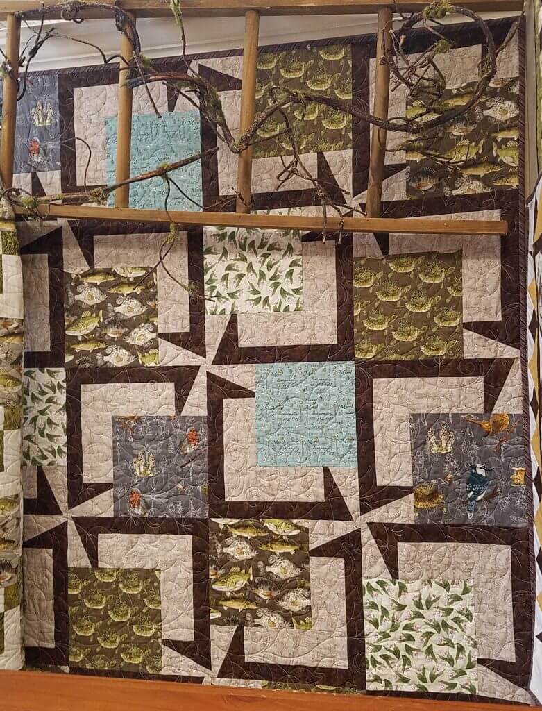 Quilt Haven on Main used BQ5 for the Minnesota Shop Hop fabric line. A wonderful way to feature a collection. 20 – 13 ½” blocks 54” x 67.5”. www.quilthavenonmain.com